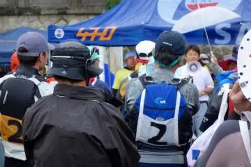 Race participants gather to hear the Mayor of Hayama prior to the race start