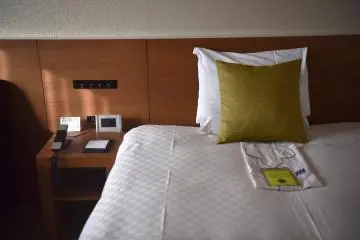 Single Room fitted with a double bed at Hotel Metropolitan Morioka