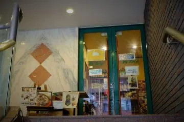 The entrance at the top of the stairs