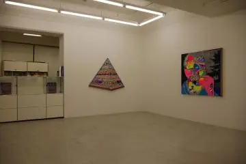 Nanzuka Gallery's white walls make Erik Parker's vibrant work stand out