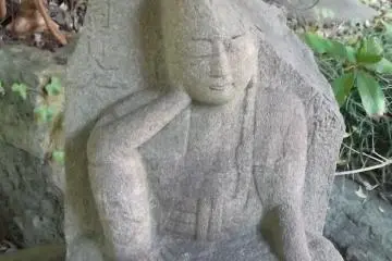 Some of the statues are damaged or weathered with age