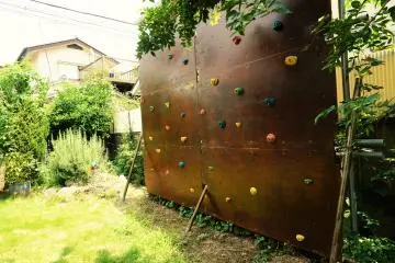 A climbing wall in the garden.