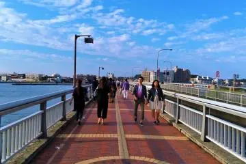 Enjoy the beach view along the Enoshima Benten-Bashi bridge which is the same way going back to the train station of Enoshima.