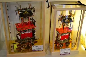 Models of the festival floats