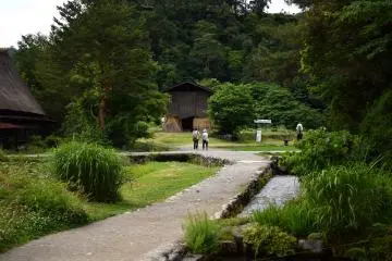 Tourists wander through the village