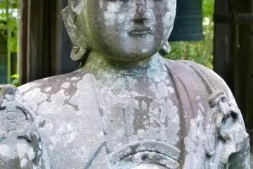 Jizzo statue on the grounds. Jizzo lead us over the bridge crossing the San-zu-no-kawa River into Hades