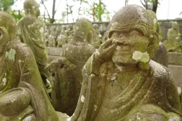 A troublemaker picking his rocky nose