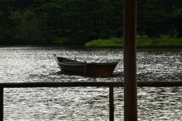 Wooden boat floating on Oike