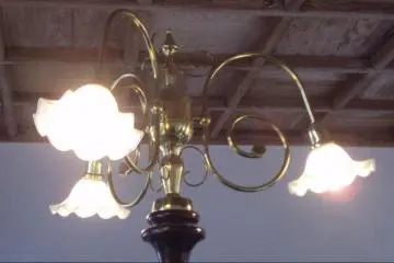 Climb up the spiral staircase and be greeted by an antique lamp.