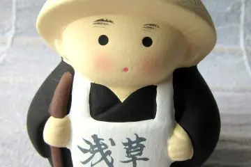 This ceramic bell of a Buddist monk reminds me that I've met them standing and accepting charity all over Japan. They were very patient!