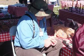 Carving a wooden whistle