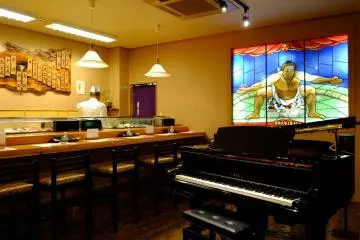 Grand piano and sushi bar