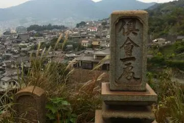 <p>On the climb up to the temple, I got lost in a cemetery with rust-coloured graves</p>