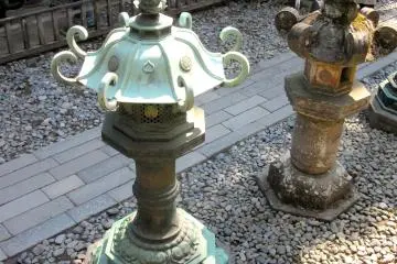 Colors of old metal and stone lanterns