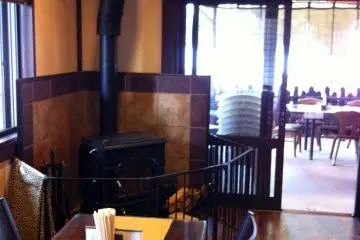 The inside seating with a wood-burning stove