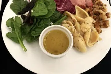 A delightful green salad in Business Class
