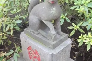 Guarding the side shrine