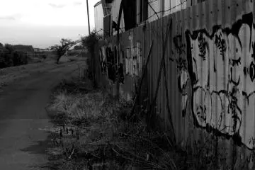 Graffiti on the wall of a construction company