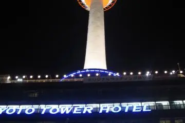 Kyoto Tower suggests observation desk and gift shops