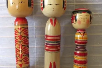 All Kokeshi dolls are different by design and have authors' signatures on bottoms