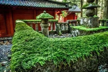 Grave of Priest Shodo with the colorful Kaizan-do Temple in the background