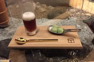 Beer for cheers!  A thick beer and edamame