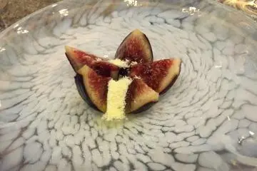 Black fig from Sado Island after the smoke settles leaving the frozen olive oil