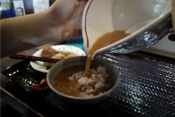 Pour your left-over soup and mix it with the rice