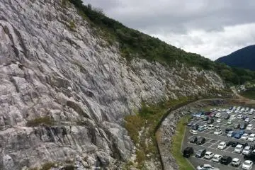 The amazing cliff bordering the parking lot is just a warm-up