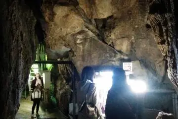 The cave is well lit and clearly marked