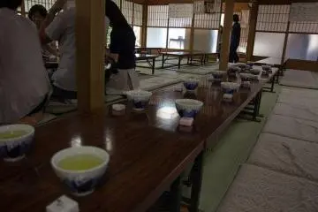 Tea being served while patrons relax and listen to the crickets.