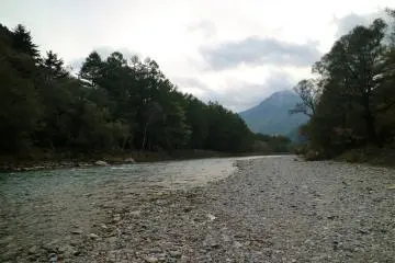 You can walk along the river on the pebbled river bank