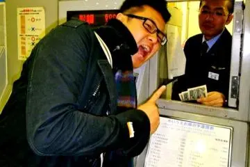 <p>Whether you are on JR or the Subway, there is a help button for most ticket machines. Press the button and the customer service officer will come out and help you behind the counter.</p>