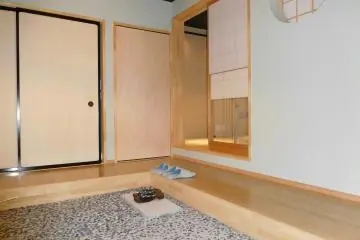 Extended genkan and cupboard space