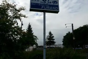 This sign will be brightly-lighted in the night. It can be spotted from the main road.