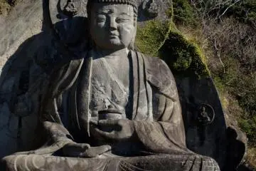 Japan's largest daibutsu (a big statue of Buddha), sculpted into the side of the mountain