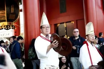 A musician play percussion instrument during the parade