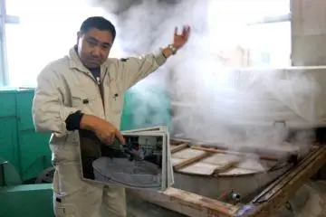 Rice steaming (Photo: Carrie Jacobs )