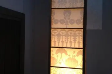This highly decorative lamp welcomes you to the gallery