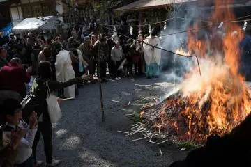 People looked on in silence as the fire continued