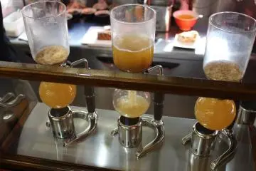 Coffee siphons help prepare the soup