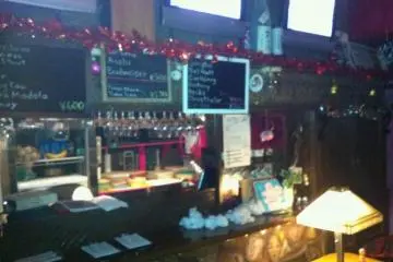 Just above the counter are a trio of TVs for watching some American DVDs