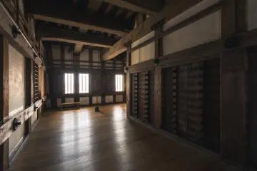 The walls on the right were used to hold weapons for battle
