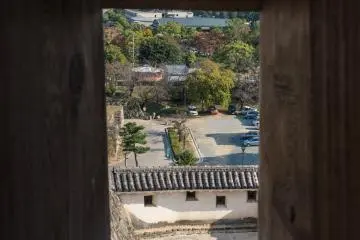 Looking through an archery port in one of the castle walls