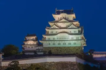Himeji Castle illuminated on a clear night