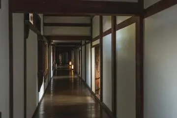 A hallway with many rooms in the west bailey where the princess resided