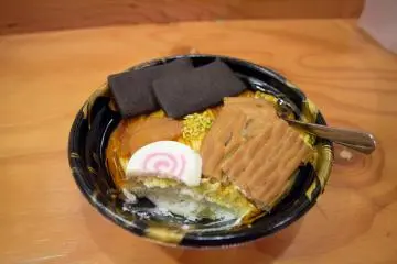 The layers of sponge cake and cream found beneath the ramen cover