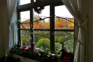 A window at the stairway landing