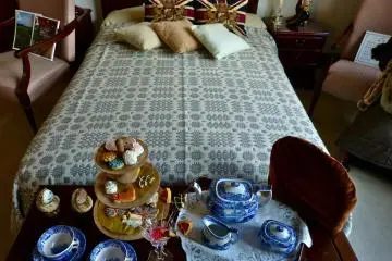 Bedroom decorated with a tea set