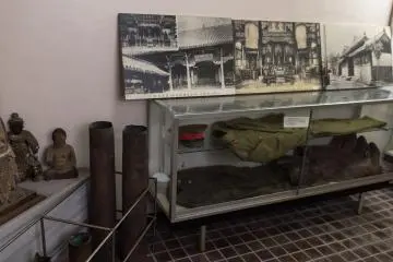 Old uniforms and artillery shells